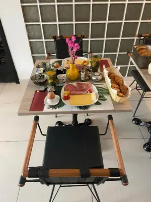 a table with food and bread on top of it at B&B groot-bijgaarden center in Groot-Bijgaarden