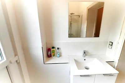 a bathroom with a sink and a mirror at César in Brussels