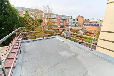a balcony with a view of a building at César in Brussels