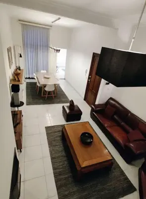a living room with a couch and a table at Modern duplex 100m2 perfect to visit Brussels in Brussels