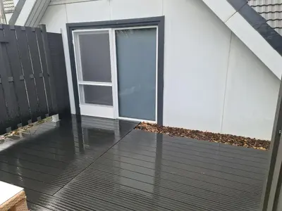 a patio with a sliding glass door on a house at De Gorzen in Oud-Turnhout