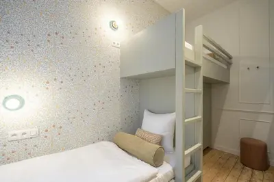 a bedroom with a bunk bed in a room at SHWAY - Le Leopold in Antwerp