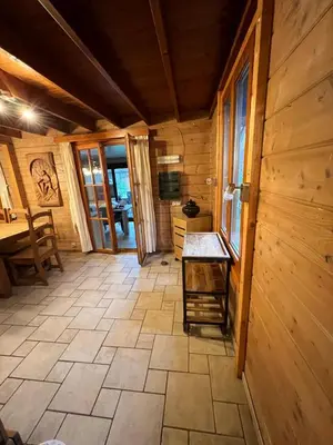 a large room with a table in a cabin at Panoramic Bungalow Sint Gillis-Waas in Sint-Gillis-Waas