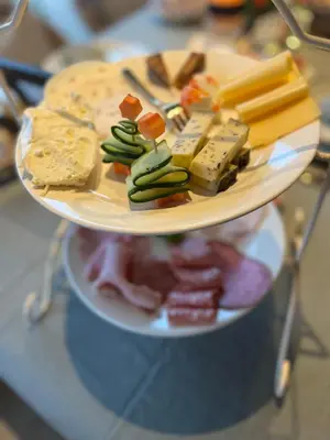 a plate of different types of food on a shelf at B&B 't klein GELUK in Ham