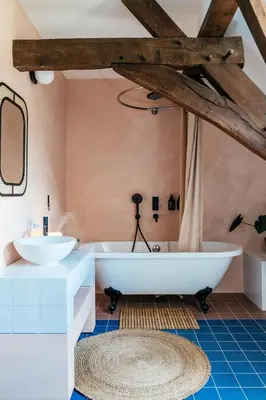 a bathroom with two sinks and a bath tub at Villa Parkbos in De Pinte