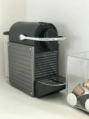 a black microwave oven with a plate on top of it at Bright City Design House! in Antwerp