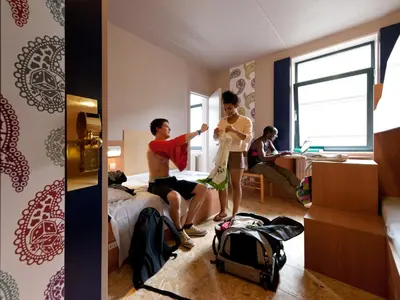 a group of people in a hotel room at Sleep Well Youth Hostel in Brussels
