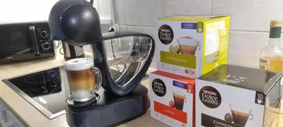 a black coffee maker sitting on a counter next to boxes at SUPERB APPARTEMENT WITH 3 BED ROOMS IN ANTWERPEN in Antwerp