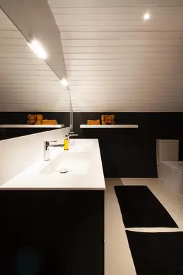 a bathroom with a white sink and a toilet at B&B Maison Blanche in Ghent