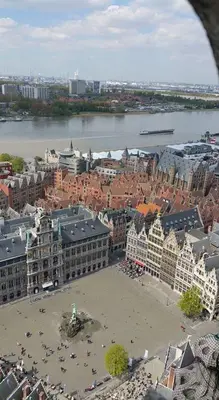 an aerial view of a city with buildings and a river at On our way to Antwerp, first stop in Mortsel