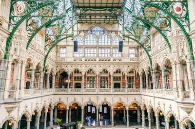 a large building with a lot of windows and ceilings at On our way to Antwerp, first stop in Mortsel