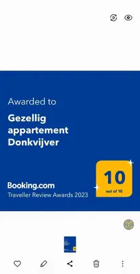 a screenshot of a website with a yellow and blue at Gezellig appartement Beveren Kruibeke Zwijndrecht Donkvijver in Beveren