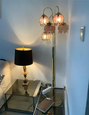 a glass table with a lamp on top of it at Cozy studio close to Zaventem Airport in Brussels