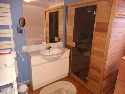 a small bathroom with a sink and a shower at B&B Wepa-hof in Oud-Turnhout