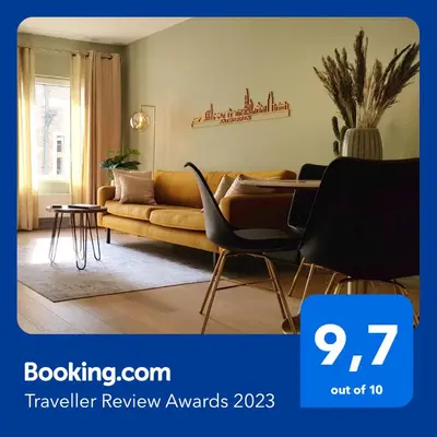 a living room with a couch and a table at BnB Antwerpen - CHIQUE in Antwerp