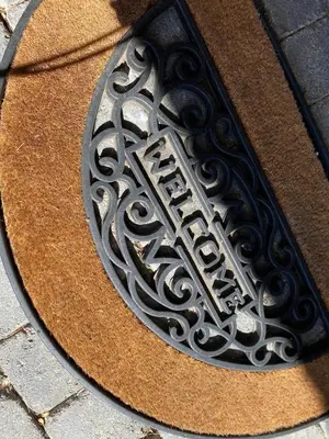 a metal sign on the side of a building at Belair Studio in Tervuren