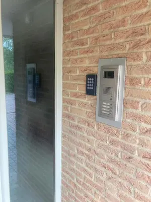 a brick wall with a pay phone on it at Belair Studio in Tervuren