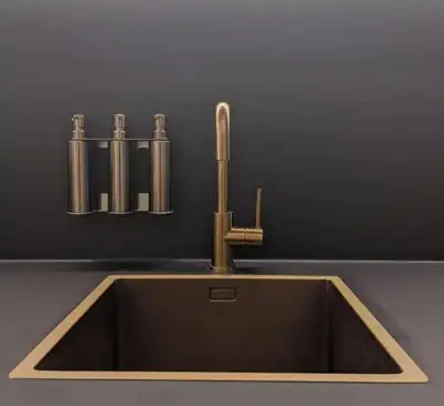 a sink with a faucet in a bathroom at Royal Diamond Apartment @ Central Station in Antwerp