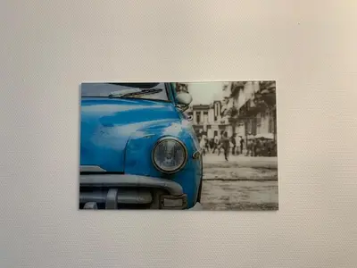a black and white photo of an old blue car at lovely two bedroom apartment with free parking in Antwerp