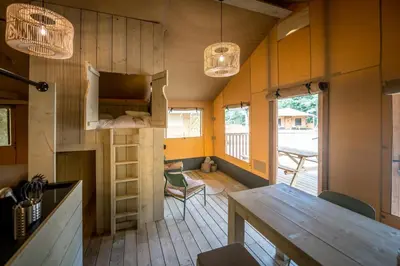 a kitchen and dining room with a table and chairs at Urban Gardens Gent in Ghent