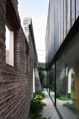 an external view of a brick building with windows at HUIS19 Luxury apartments in Ghent