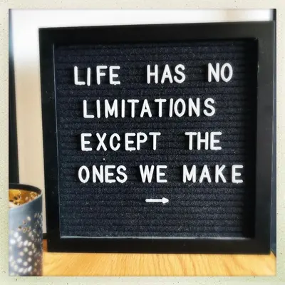 a sign that says life has no limitations except the ones we make at Cozy two bedroom Apartment near city centre Gent in Ghent