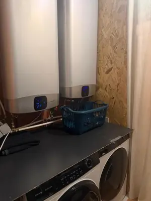 a kitchen with two microwaves on top of a counter at Perk25A in Steenokkerzeel