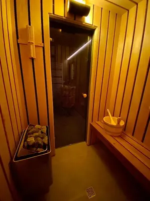 a small bathroom with a shower and a sink at Superbe logement près de Bruxelles avec spa privé in Brussels