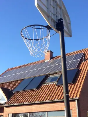 a basketball hoop with solar panels on a roof at B2B-flats in Ternat