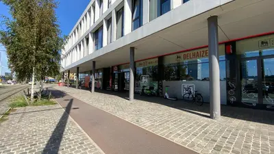a building with a lot of windows on a street at Oneluxstay Antwerp City Centre in Antwerp