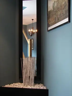 a room with a mirror and a table with rocks at B&B Allegra Nova in Ghent