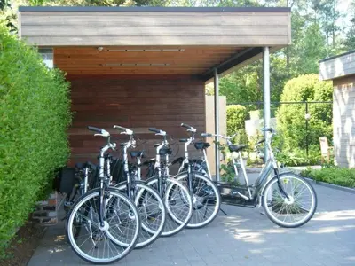 a group of bikes parked next to a building at Holiday Home and Office Domisi'l in Wachtebeke