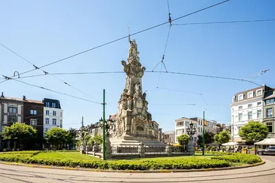 a statue in the middle of a city at Nice furnished appartement AAA- location in Antwerp