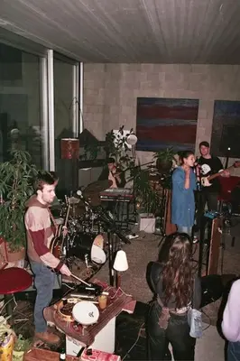 a group of people playing drums in a room at Mari's: Multifunctional Shelter with big Garden in Ghent