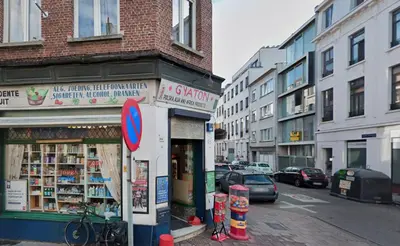 a gas station on the side of a city street at OneLuxStay near Fashion District in Antwerp
