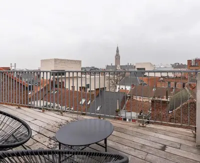 a view of a city skyline from a balcony at New apartment with big terrace and great views! in Leuven
