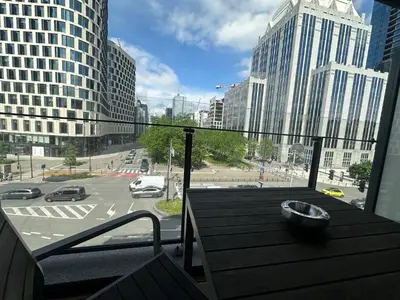 a balcony with a view of a city street with buildings at Apartment in Brussels City with Beautiful View in Brussels