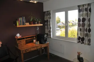 a room with a desk and a window and a table at at Number 1 in Rumst
