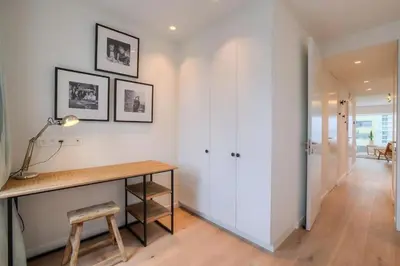 a home office with a desk and a chair at ANCHOR LODGE ANTWERP Unique Appartment view MAS! in Antwerp