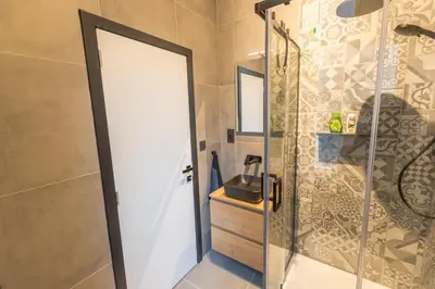 a bathroom with a shower and a sink at Golden Dove Luxury Aparts in Brussels