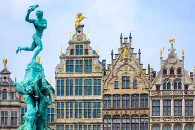 a statue in front of a large building at Holiday Inn Express Antwerp - City Centre by IHG in Antwerp