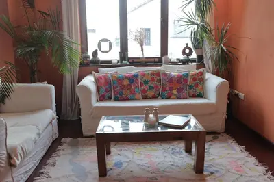 a living room with a couch and a coffee table at Spacious Villa in Dilbeek with Private Garden, Ideal for Families & Business in Dilbeek
