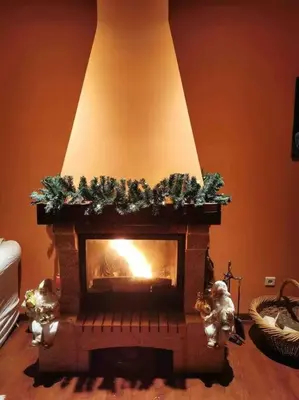 a living room with a fireplace with christmas decorations at Spacious Villa in Dilbeek with Private Garden, Ideal for Families & Business in Dilbeek