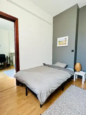 a bedroom with a bed in a room at Cozy, comfortable apt, well located - EU ULB VUB in Brussels