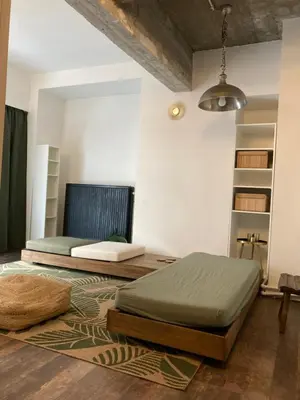 a bedroom with two beds in a room at Quest house in the city in Ghent