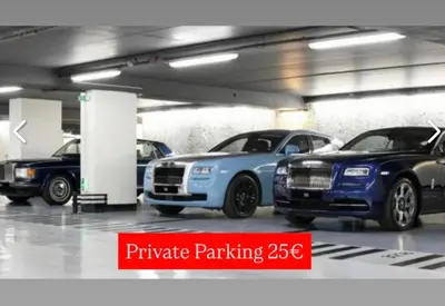 a parking garage with several cars parked in it at B&B Art and Sleep in Antwerp