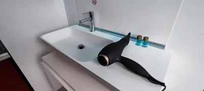 a whale head on a sink in a bathroom at Logeerkamer XXL 25 m2 in Zemst