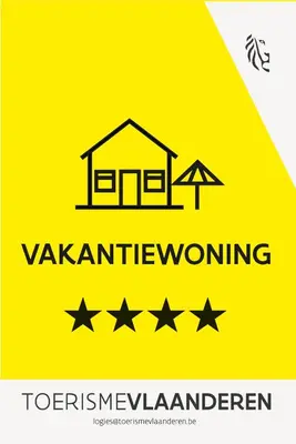 a yellow warning sign for a house with stars at De oude statie in Tessenderlo