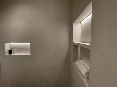 a bathroom with a toilet paper dispenser on the wall at Historic 3 Bedroom Art-Nouveau Apartment with Airconditioning - Walk to Station Gent Sint-Pieters & Close to City Centre in Ghent