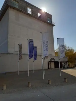 a group of signs in front of a building at Het Maelslot (Mechelen) in Mechelen